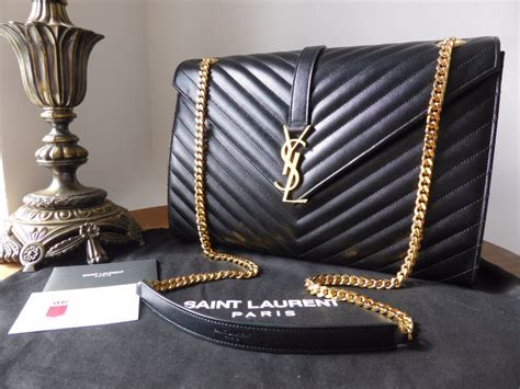 ysl bag black quiled|YSL black bag with chain.